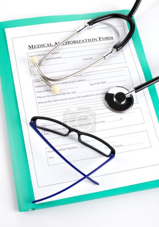 Medical  form,  glasses and   stethoscope