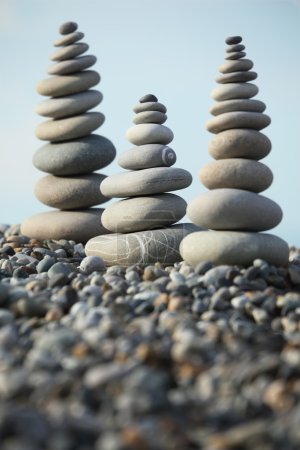 Zen stones against sky