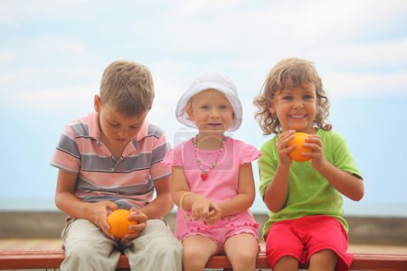 Children with oranges