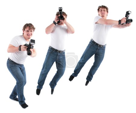 Young man goes with camera