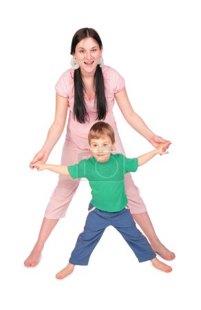 Pregnant girl with child doing exercise