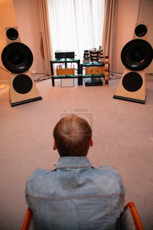 Man listens music from vinyl