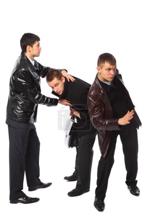 Two bodyguards protect businessman