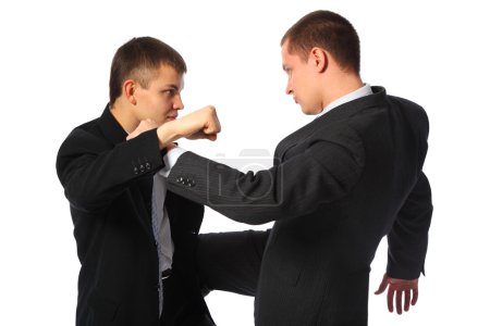 Two fighting businessmen