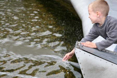 Child near the fountain