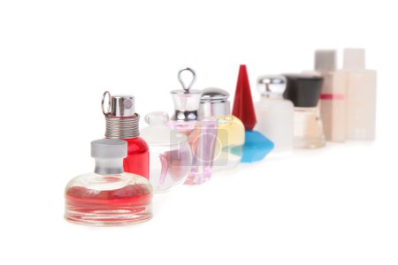 Row of flasks with perfume