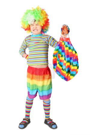 Boy in clown dress with multicolored baloon isolated on white ba