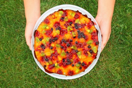 Fruit pie against grass