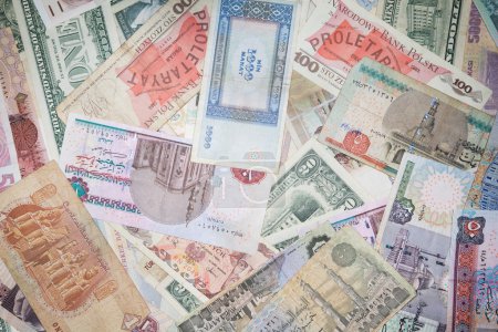 Background from banknotes of various monetary currencies