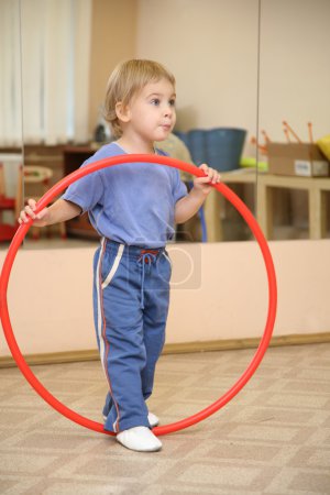 Little girl and hoop