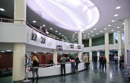 Listeners in the foyer of the concert hall