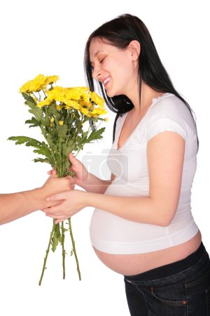 Presenting flowers to pregnant girl