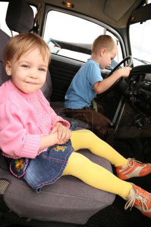 Girl and boy in car