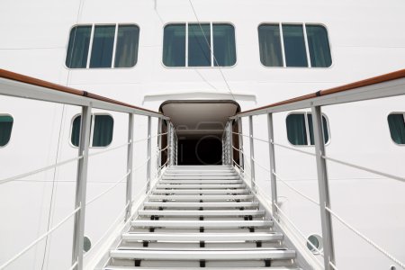 Entrance with rails and stairs in big cruise passenger liner