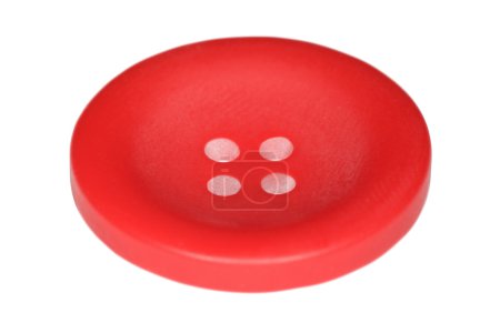 Red button for clothes isolated on white background