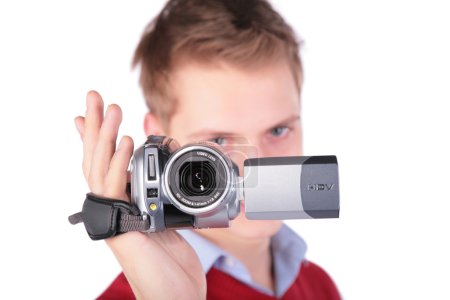 Boy in red jacket with HDV camera