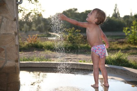 Child near the fountain