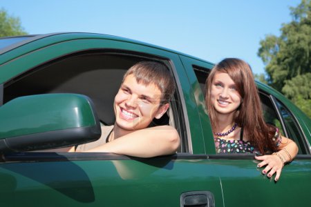 Gay and girl in car