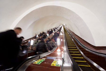 Moscow - March 23: on escalators of metro station Komsomo