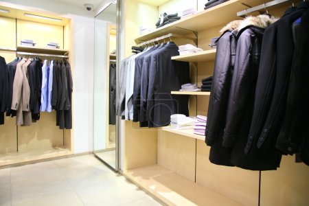 Clothes on racks in shop