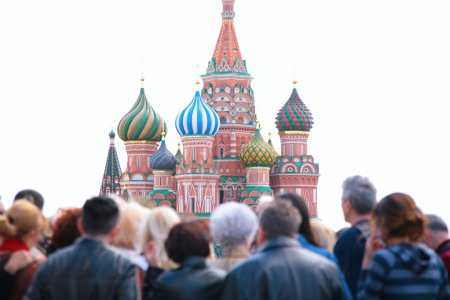 Tourists look at st.Basil cathedral