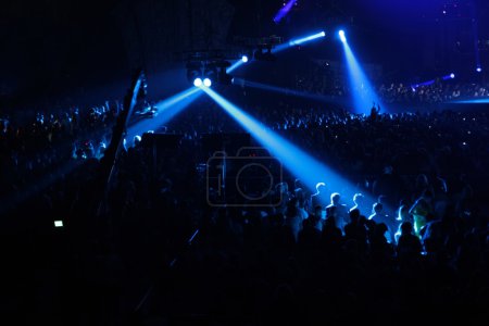 Blue spotlight on concert