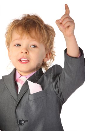 Boy in suit with rised finger