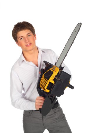 Young man with chainsaw