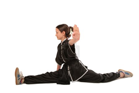 Wushu girl makes splits