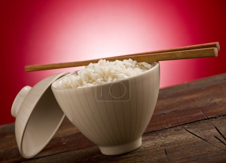 Rice with asian chopstick