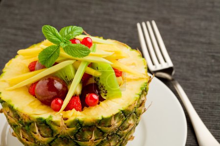 Pineapple stuffed with fruits