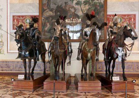 The exhibition in the Hermitage Museum, four horsemen in armor.
