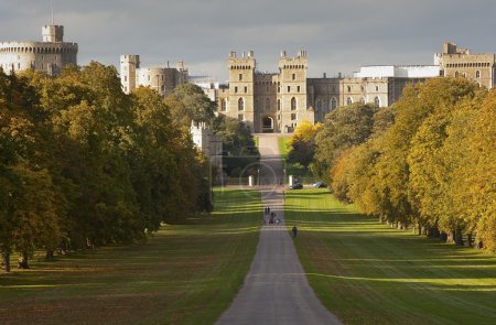 Windsor Castle viewed along Long Walk in Windsor Great Park in E