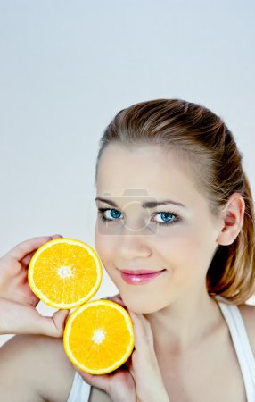 Beautiful girl with oranges dv