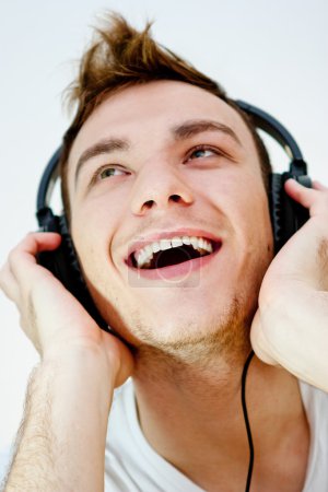 Young man enjoying music