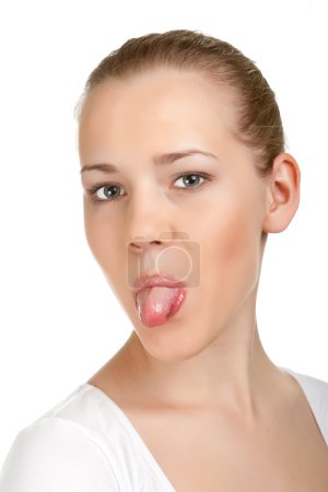 Portrait of attractive smile teenage girl, show her tongue