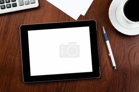 Blank tablet at the desk with clipping path
