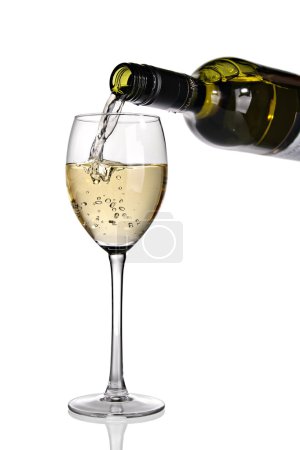 White wine poured into glass