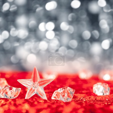 Christmas crystal star on ice cubes