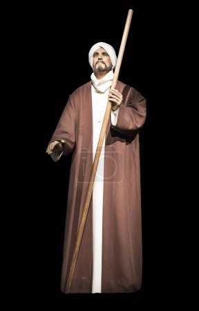 Cordoba, Spain - 2018, Sept 8th: Life-sized sculpture of Ibn Arabi, Andalusian Muslim scholar, mystic, poet, and philosopher. Calahorra Tower Museum, Cordoba, Spain