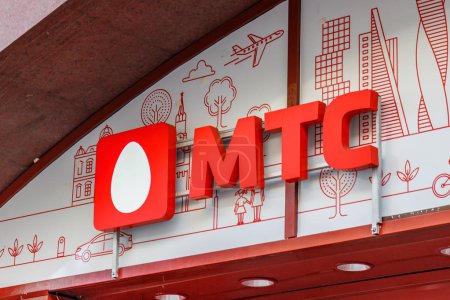 Moscow, Russia - September 13, 2019: MTS sign on the storefront close-up. Signboard of Mobile TeleSystems russian telecommunications company