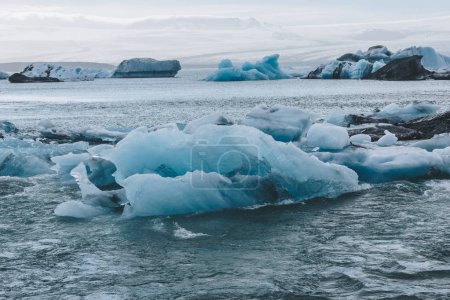 glacier ice pieces floating in lake in Jokulsarlon, Iceland