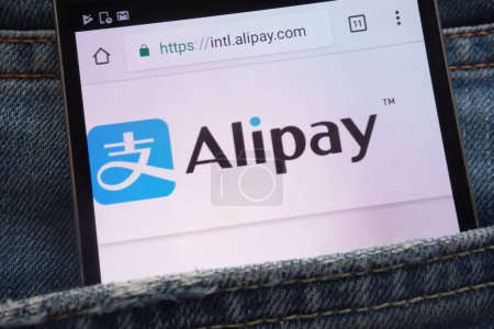 KONSKIE, POLAND - JUNE 02, 2018: Alipay website displayed on smartphone hidden in jeans pocket