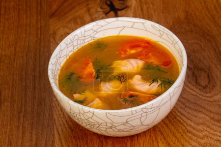 Fish soup with salmon and tomato