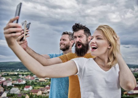 Mobile internet and social networks. Mobile dependency problem. Girl and man with mobile smartphones communication online. Selfie time. Life online. People taking selfie or streaming online video