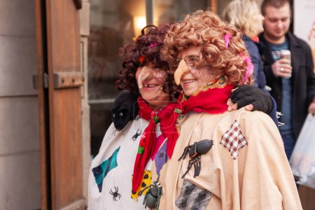 PRAGUE, CZECH REPUBLIC - APRIL 30, 2017: Costumed women in the streets of Prague during the carodejnice festival, or witch burning night