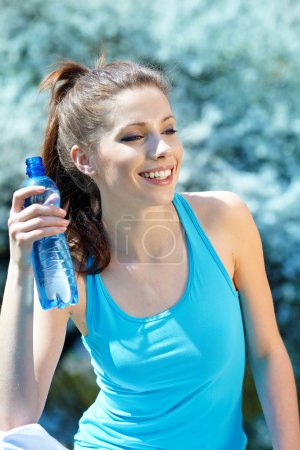 Beautiful Fitness Woman Drinking Water