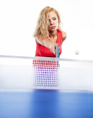 Sexy blonde with blue ping pong racke tplaying