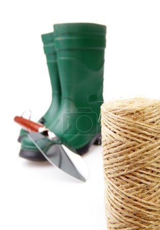 Garden boots with tool and watering