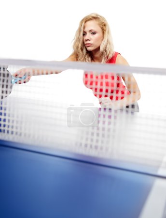 Woman playing ping-pong isolated on white